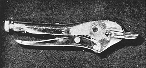 Female circumcision clamp closed (48280 bytes)